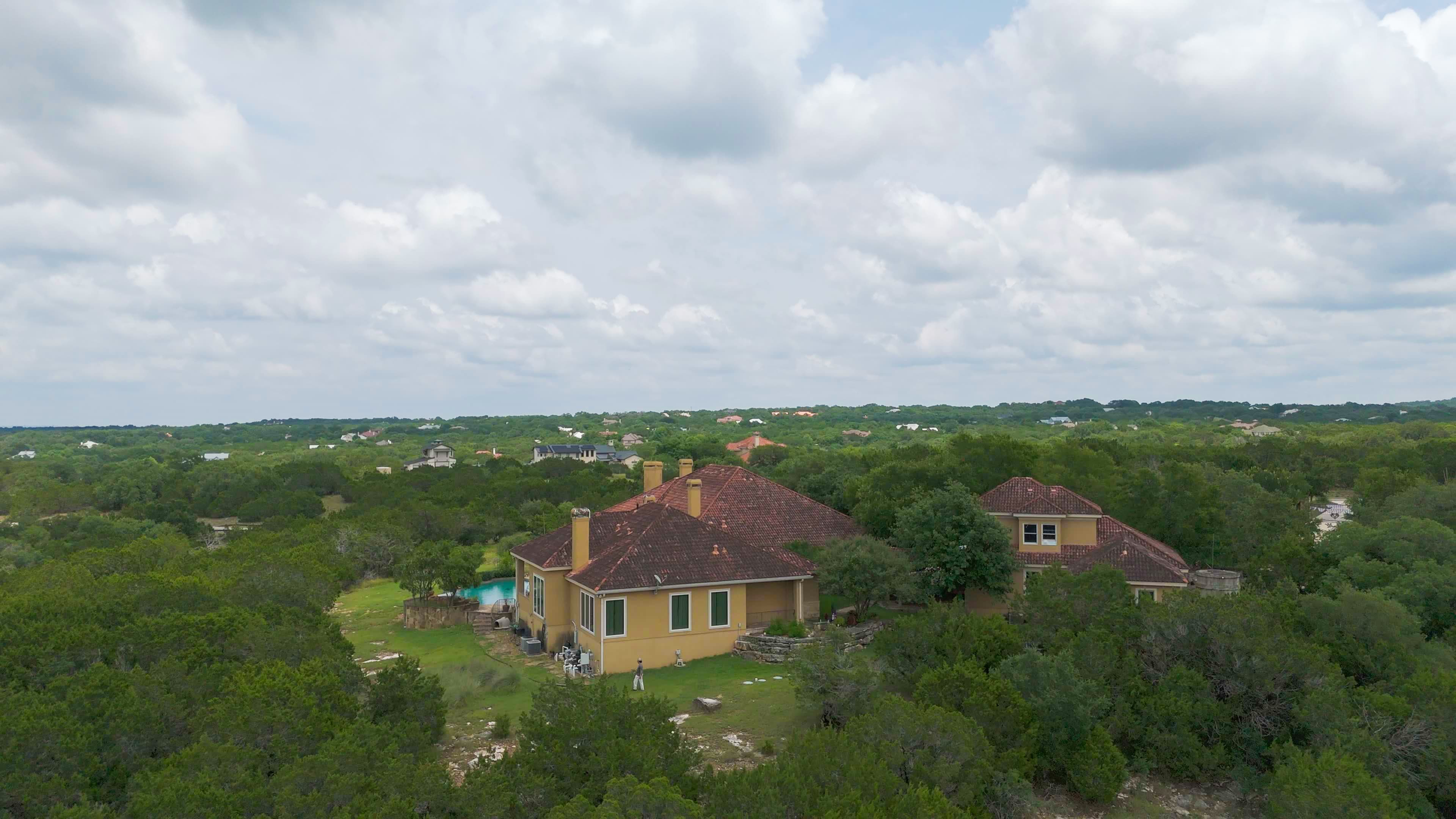 Frame from a narrative listing film showing a property at golden hour
